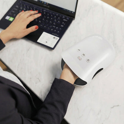 Ledningsfri håndmassager med varme og kompression til gigt og karpaltunnelsyndrom